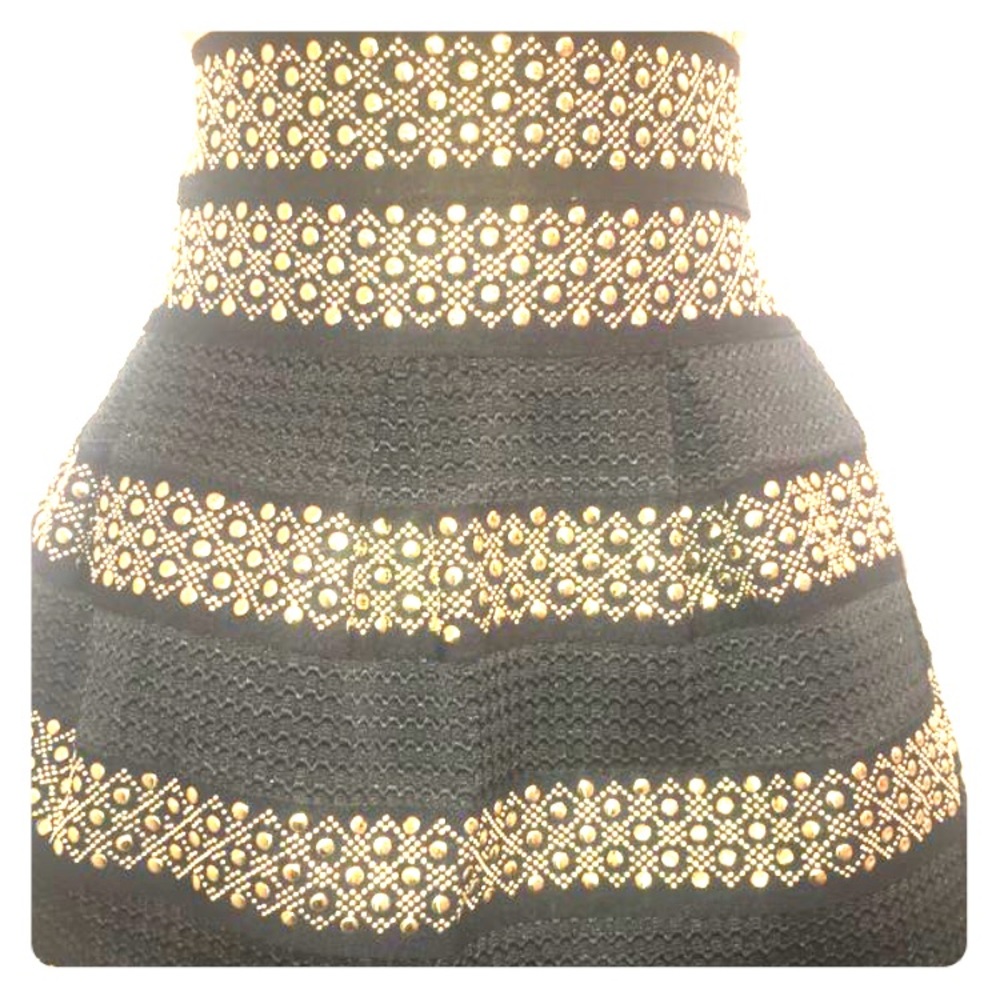 Black pleaded with gold studs